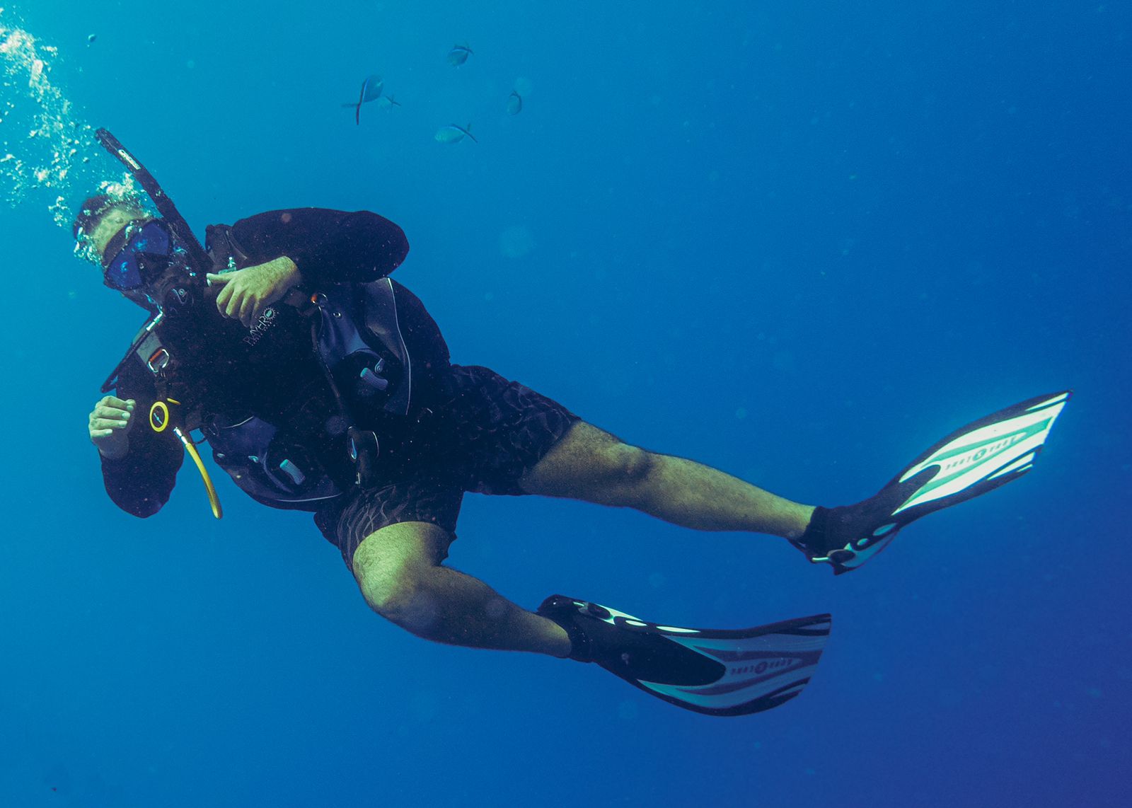 Solo diver in open blue water
